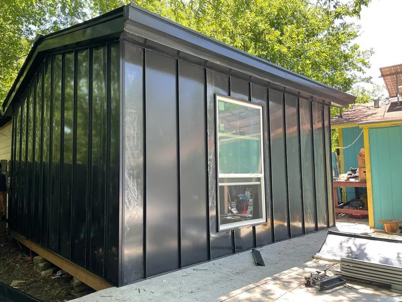 Black standing seam metal wall panels for Metal Roof Installation in Atoka