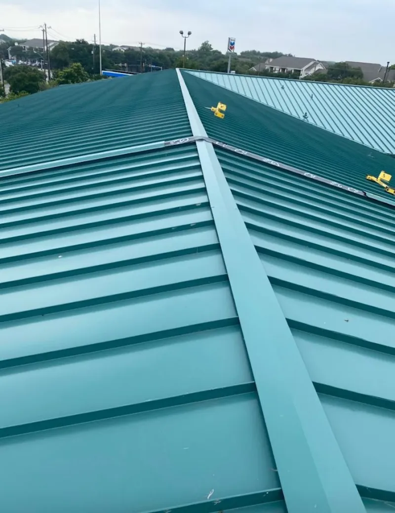 Green commercial metal roof ridge and valley for Metal Roof Repair in Atoka